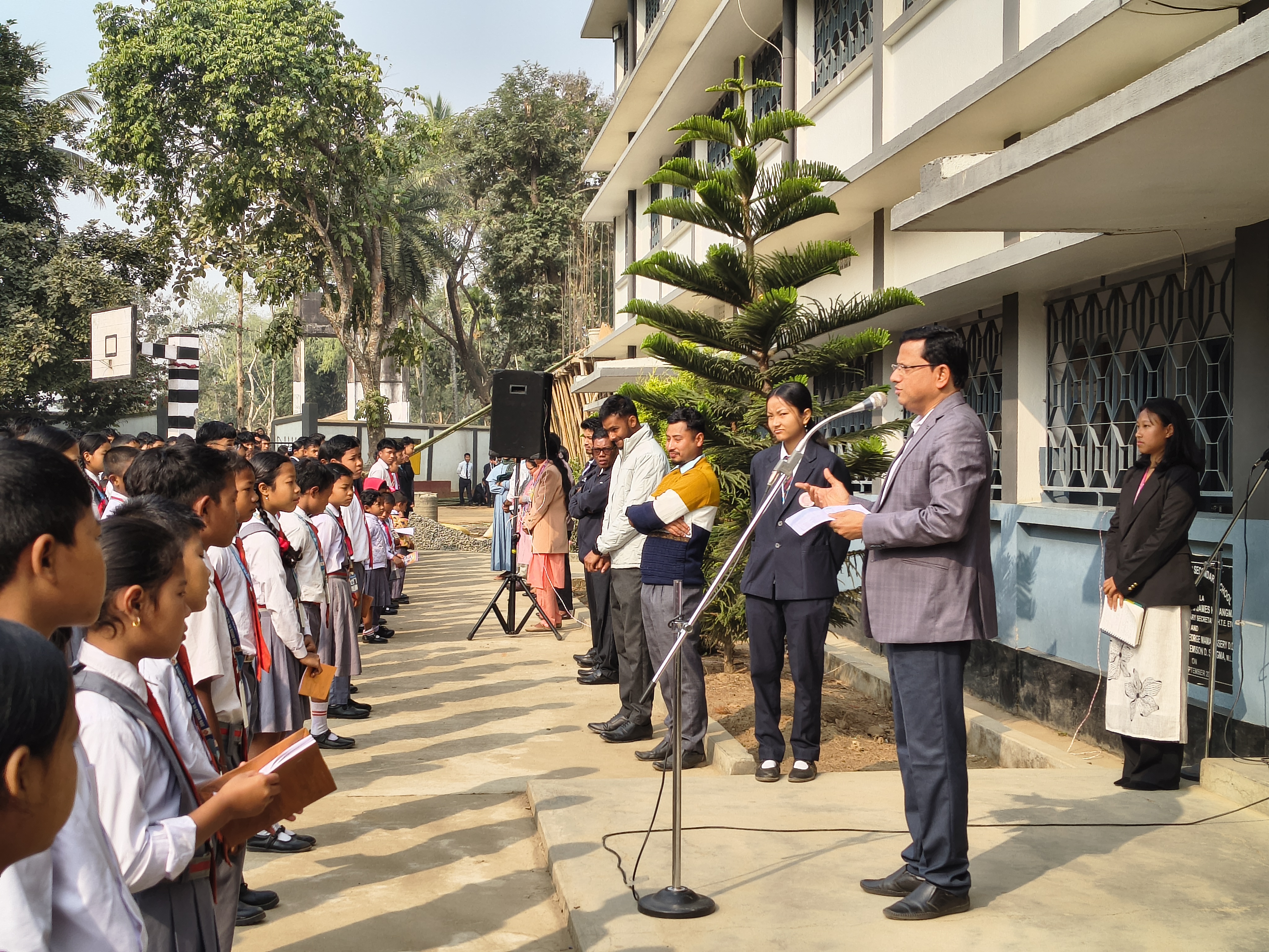 The Principal addressing students at assembly