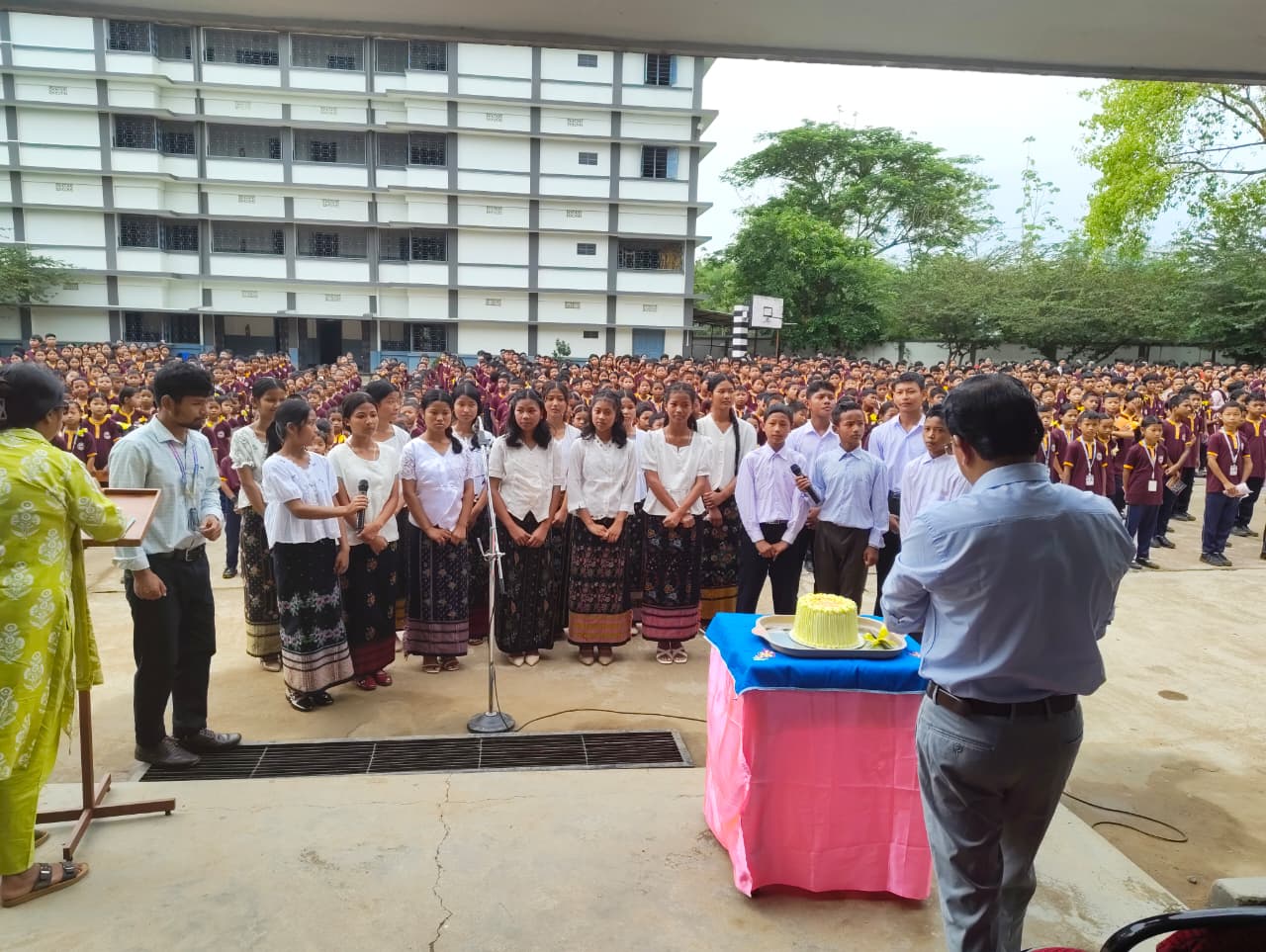 Students singing on stage