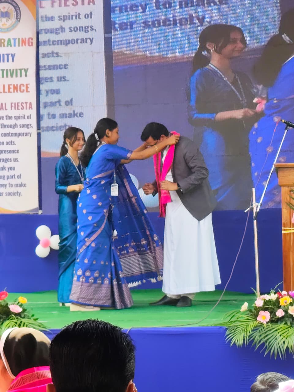 Principal being honoured by staff and students