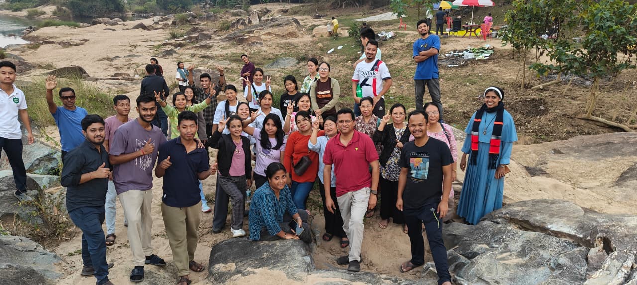 Staff of Don Bosco Higher Secondary School together at the annual picnic
