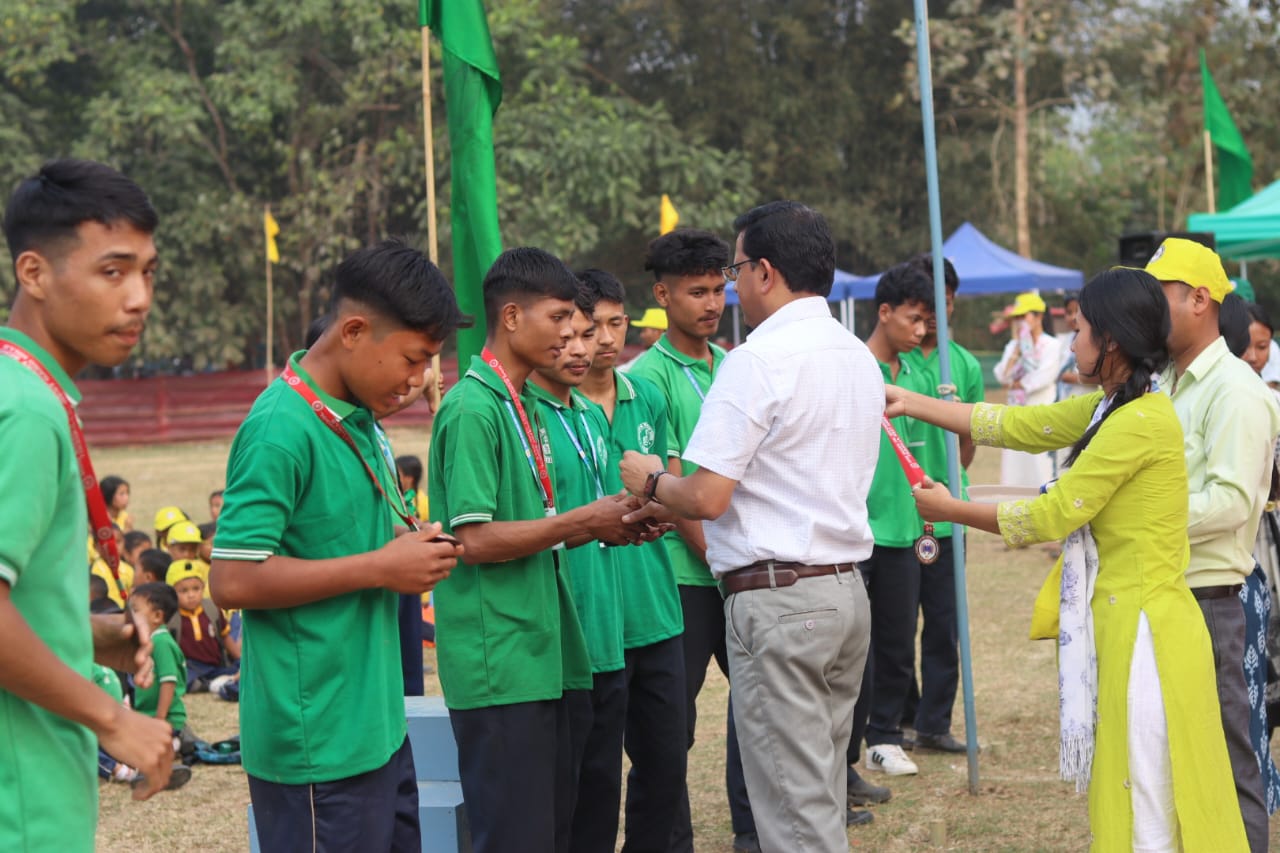 Green House members receiving medals